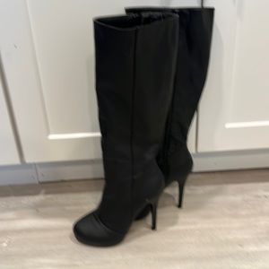 Black leather high heel boots